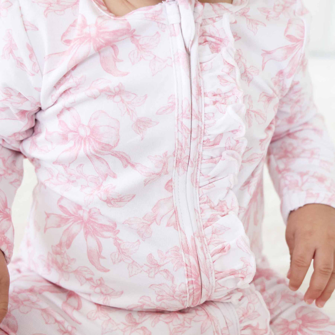 Pink Fancy Frills Bows Ruffle Zipper Footie - Caden Lane