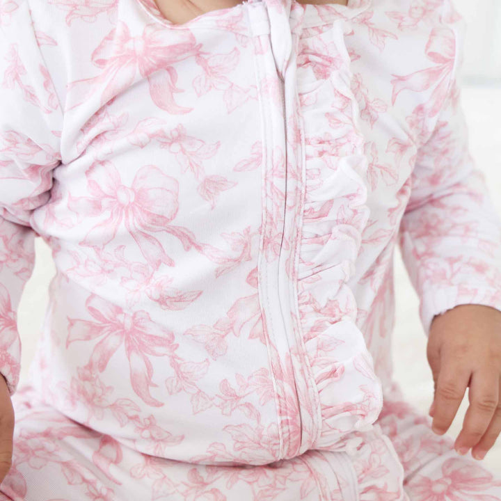 Pink Fancy Frills Bows Ruffle Zipper Footie - Caden Lane
