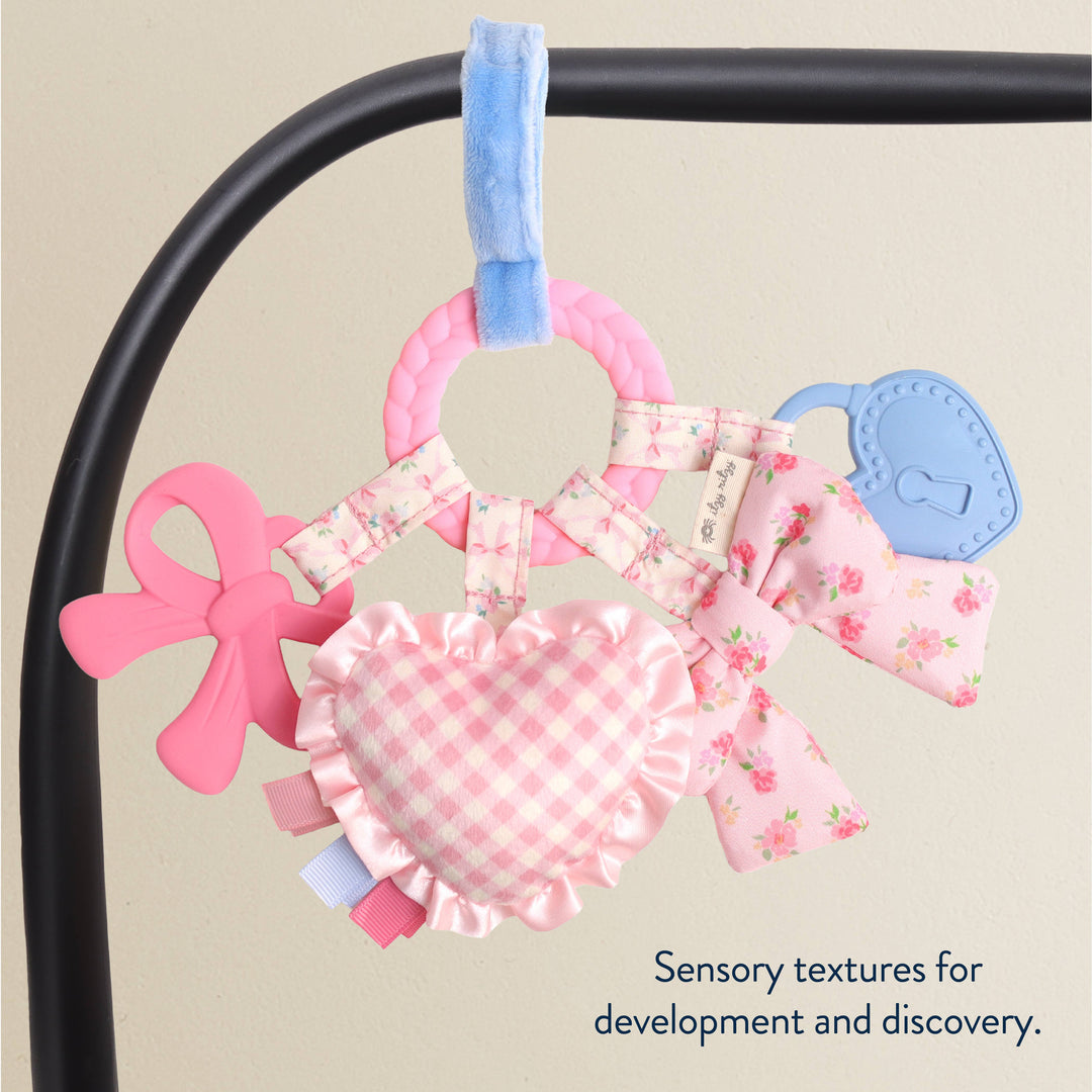 Bow Bitzy Busy Ring™ - Itzy Ritzy