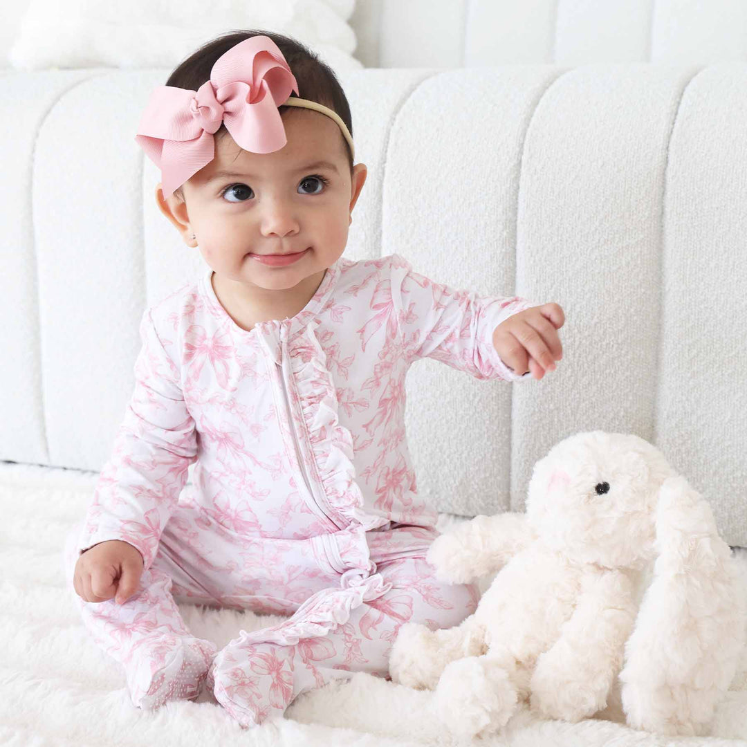 Pink Fancy Frills Bows Ruffle Zipper Footie - Caden Lane