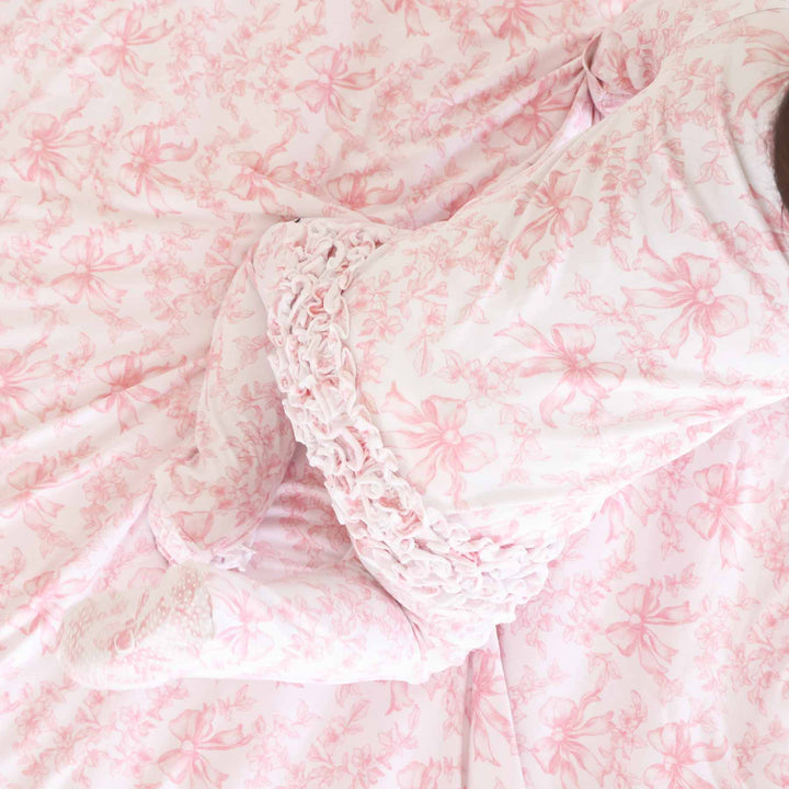 Pink Fancy Frills Bows Ruffle Zipper Footie - Caden Lane