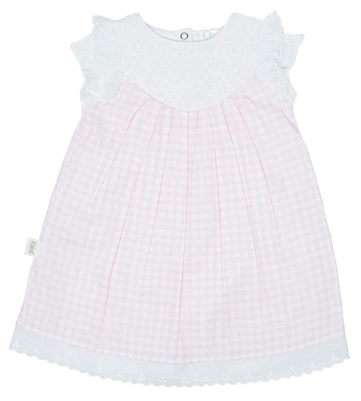 White baby dress with pink stitching on a white background