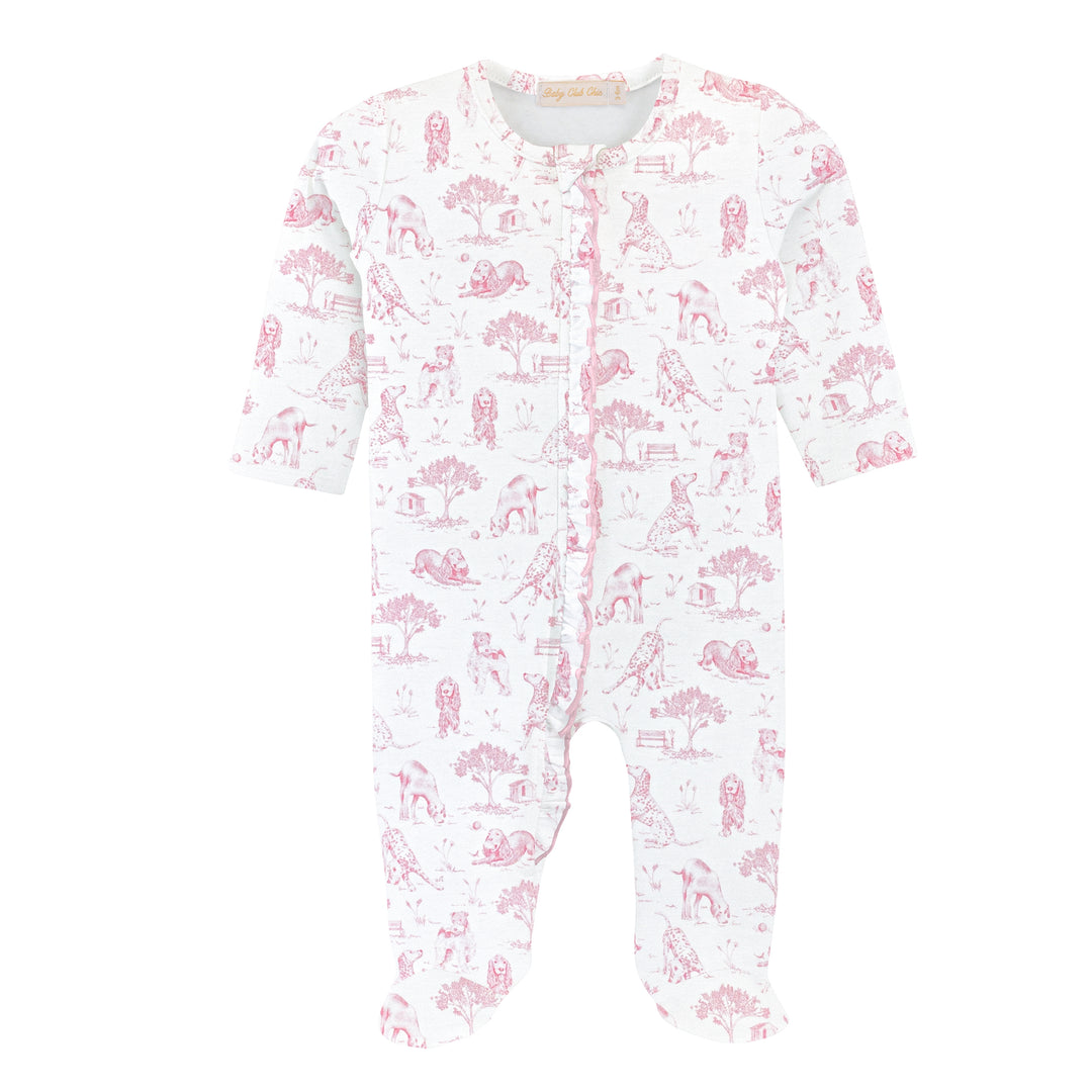 Baby onesie with pink dog pattern on a white background