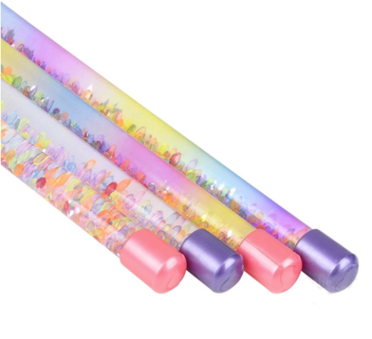 Colorful tube with beads on a white background