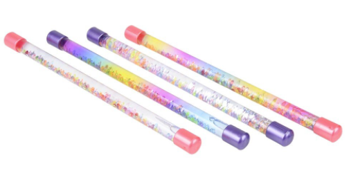 Set of colorful wands with decorative caps on a white background