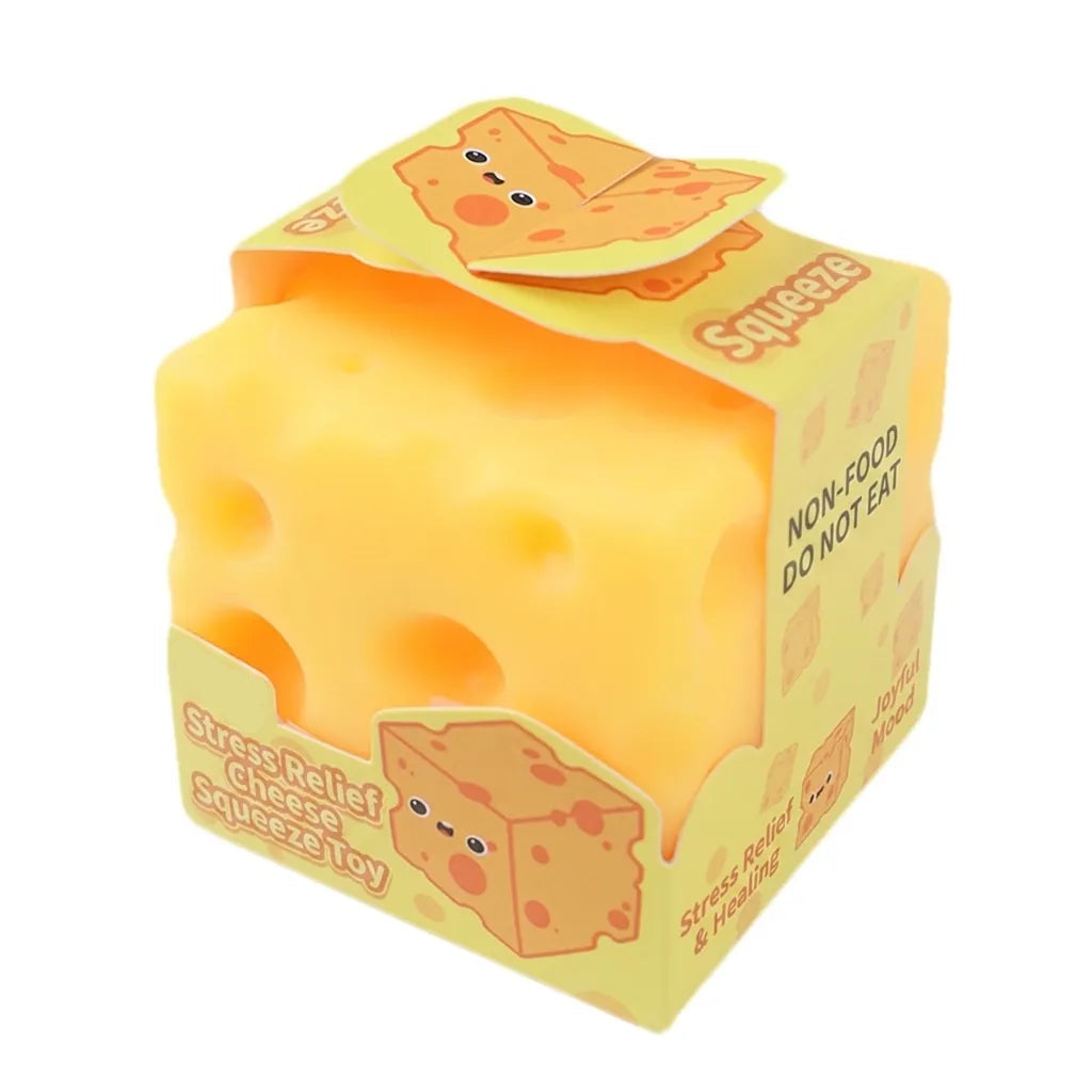 Yellow cheese-shaped stress relief toy with cartoon face on a white background