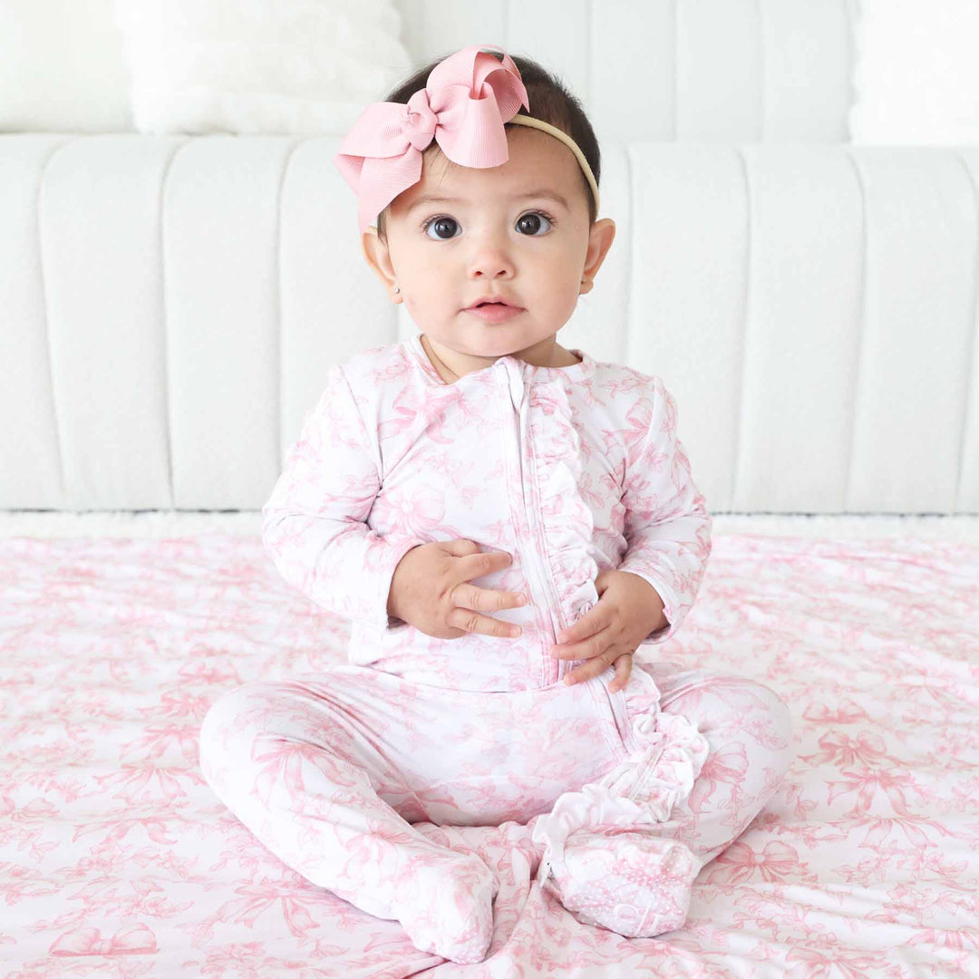 Pink Fancy Frills Bows Ruffle Zipper Footie - Caden Lane