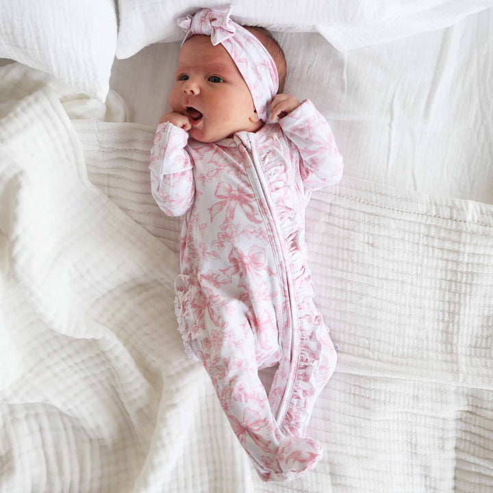 Pink Fancy Frills Bows Ruffle Zipper Footie - Caden Lane