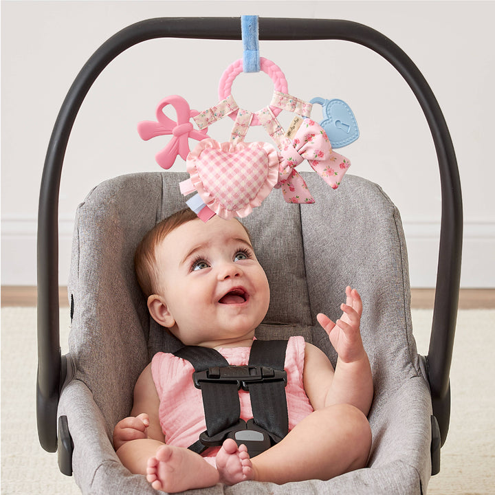 Bow Bitzy Busy Ring™ - Itzy Ritzy
