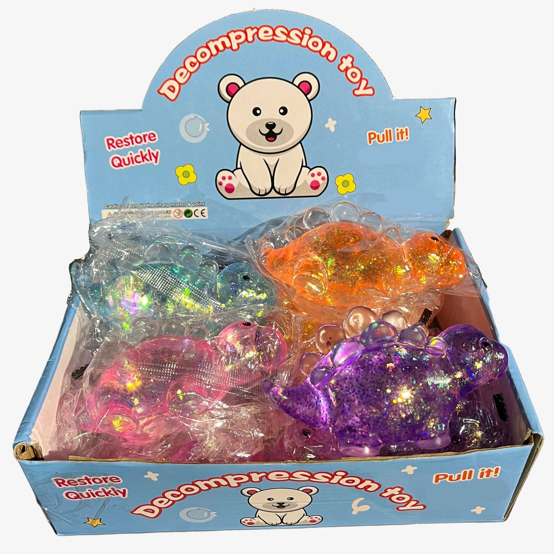 box of glitter dinosaur squishy toys