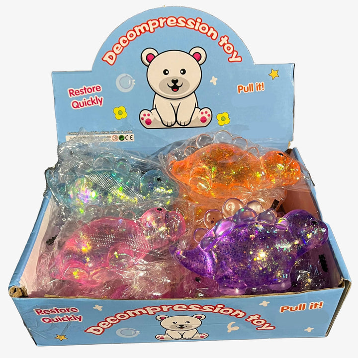 box of glitter dinosaur squishy toys