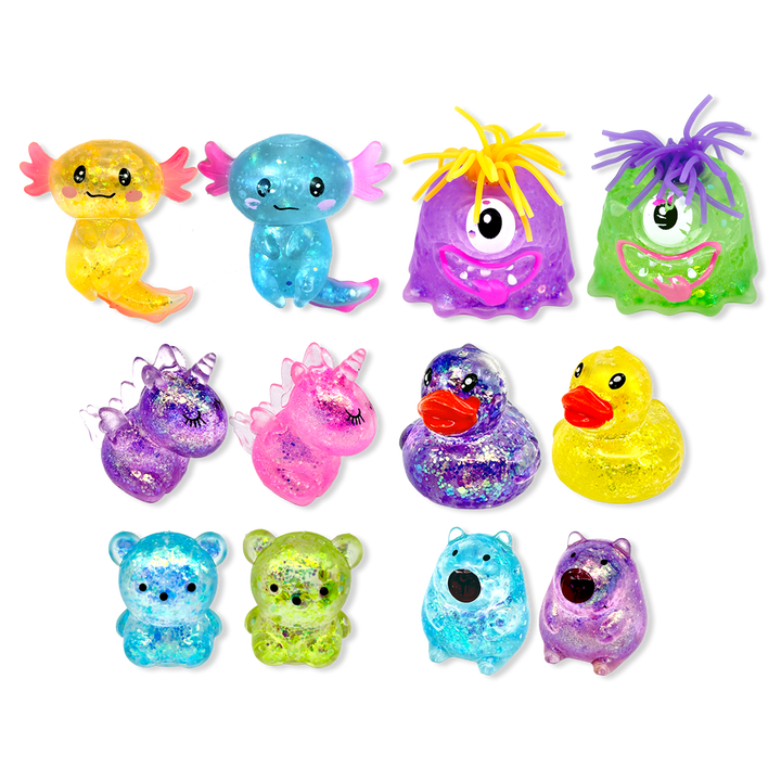 Colorful glittery figurines on a white background