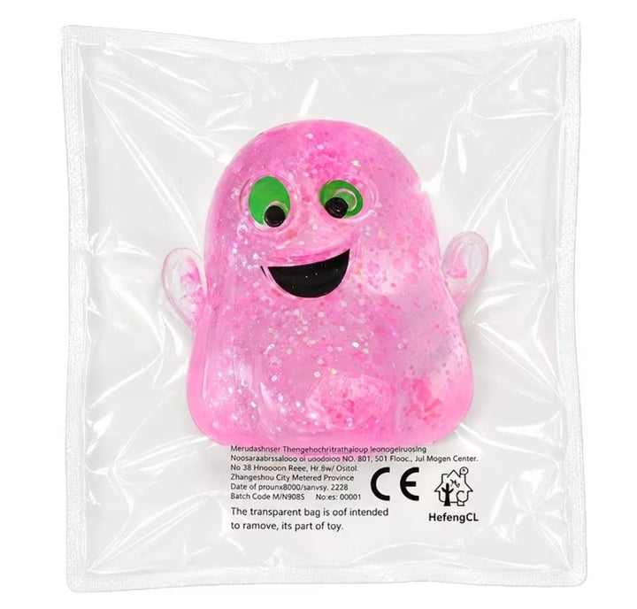 A pink glittery ghost-shaped bath bomb toy inside a clear plastic bag with printed product information and CE/HefengCL logos on a white background.
