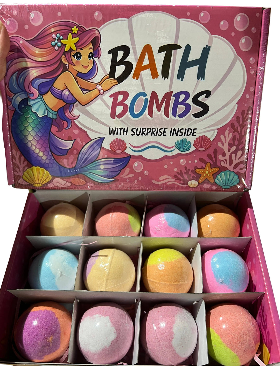 Box of bath bombs with a mermaid design on the packaging.